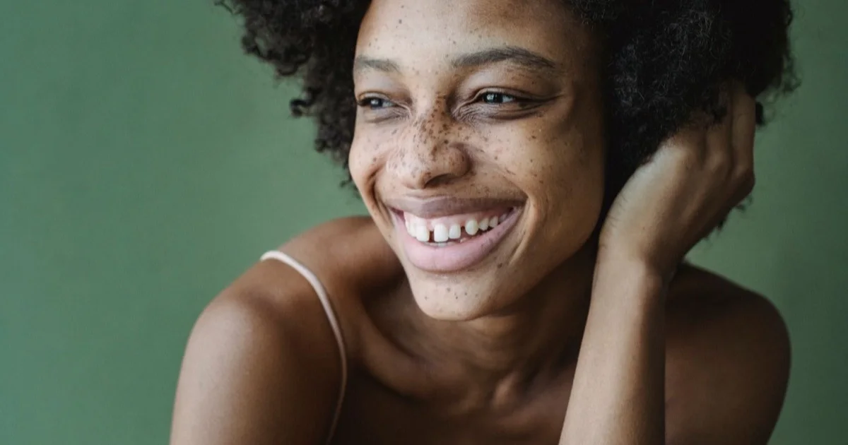 Smiling woman — natural smile proportions