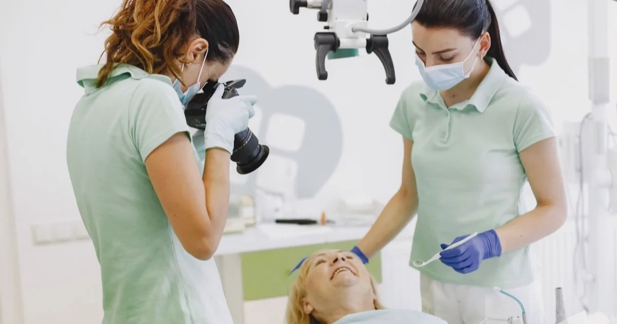 Dentists caring for a patient