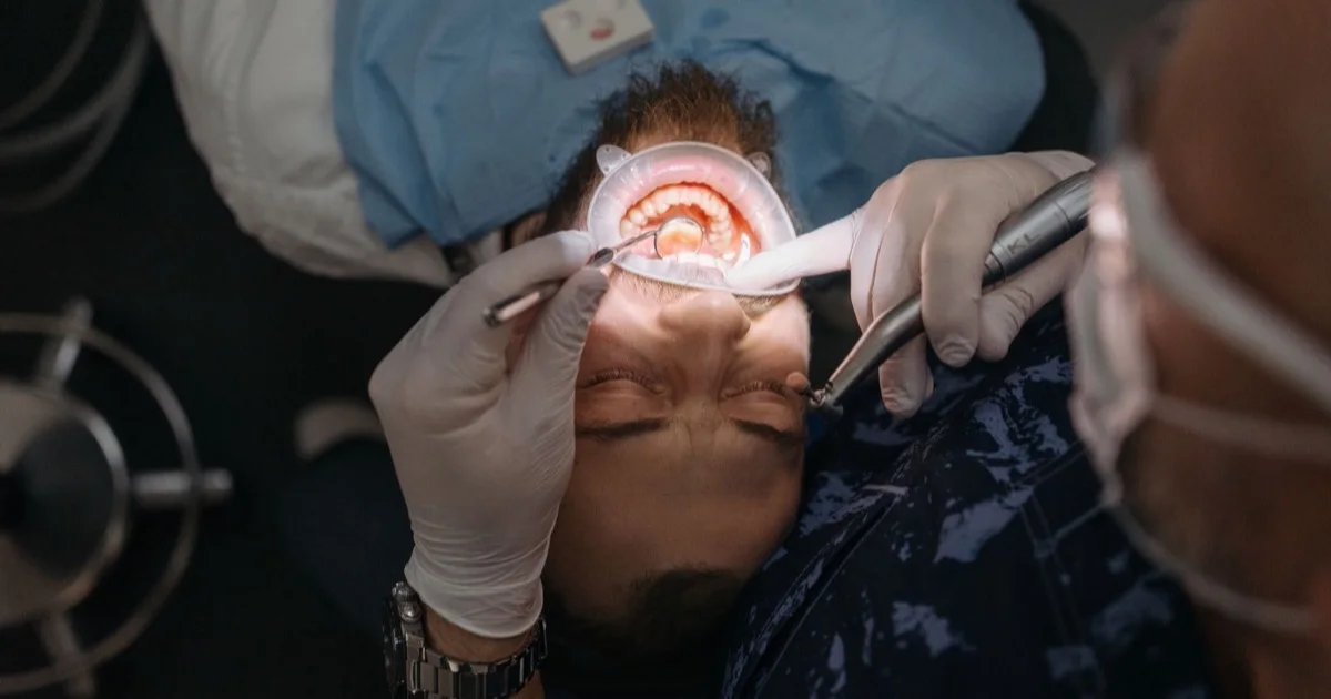 Dentist carrying out a detailed dental examination