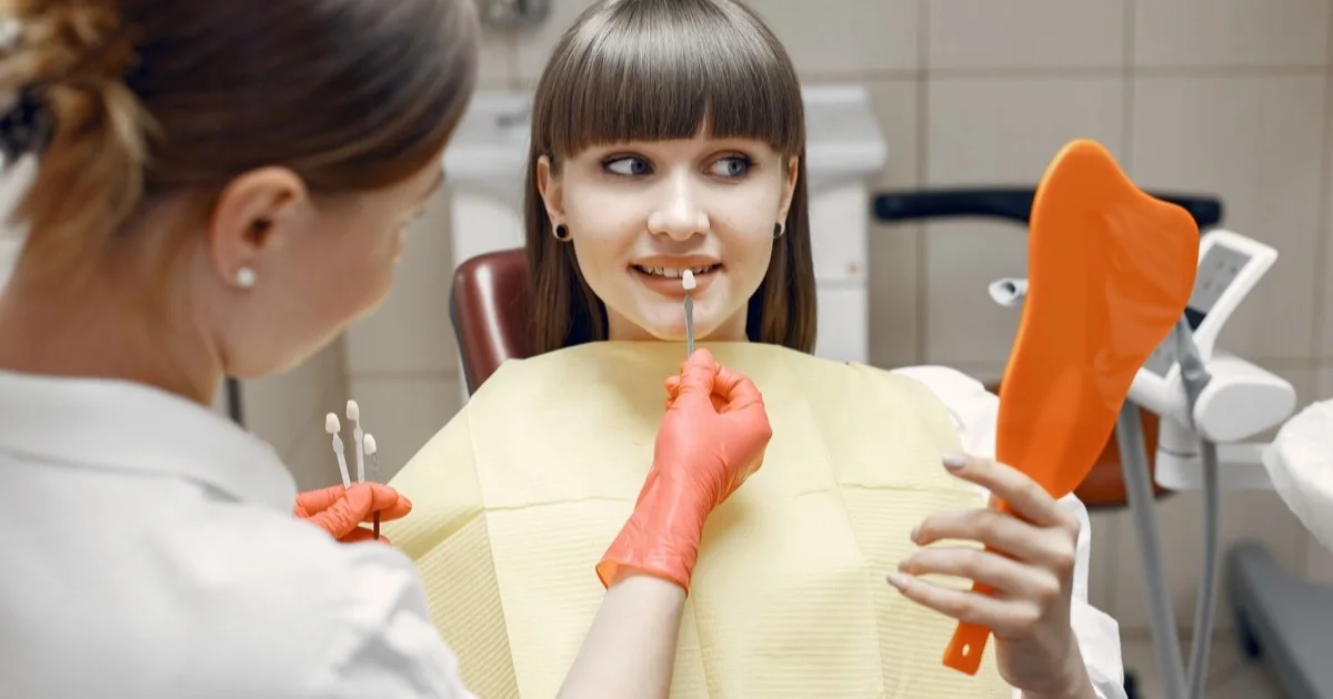 Dentist advising a patient about veneers